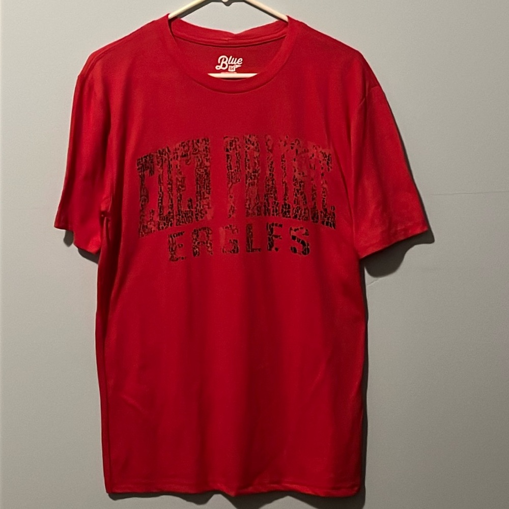Blue 84 Red Short Sleeve w/ spotted black lettering of Eden Prairie Eagles